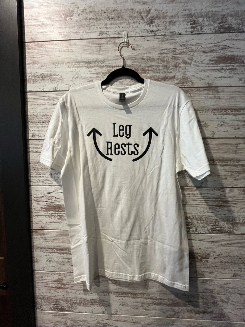 Gildan White Short Sleeve Tee with Black Arrow Graphic and "Leg Rests" Text